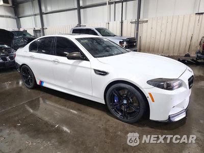 Czwarte zdjęcie samochodu z boku: 2013 BMW M5 VIN:WBSFV9C56DD095727 - miniatura