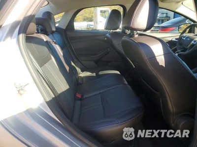 Zdjęcie 10 z 12 samochodu: 2014 FORD FOCUS TITANIUM VIN:1FADP3J24EL346854 - miniatura
