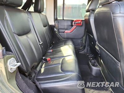 Zdjęcie 10 z 12 samochodu: 2015 JEEP WRANGLER UNLIMITED SAHARA VIN:1C4BJWEG3FL743774 - miniatura