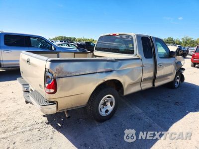 Trzecie zdjęcie samochodu z tyłu: 2000 FORD F150 VIN:1FTRX17WXYKA58099 - miniatura