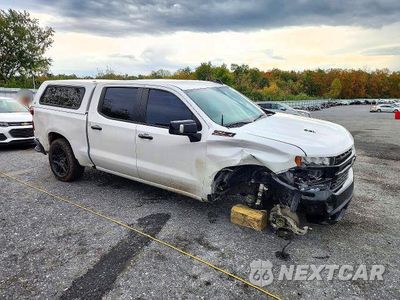 Czwarte zdjęcie samochodu z boku: 2022 CHEVROLET SILVERADO LTD K1500 LT TRAIL BOSS VIN:3GCPYFEL7NG120913 - miniatura