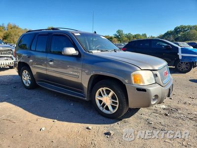 Czwarte zdjęcie samochodu z boku: 2009 GMC ENVOY DENALI VIN:1GKET53M692111506 - miniatura