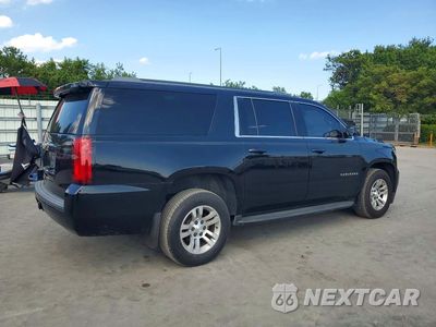 Trzecie zdjęcie samochodu z tyłu: 2019 CHEVROLET SUBURBAN K1500 LT VIN:1GNSKHKC3KR170559 - miniatura