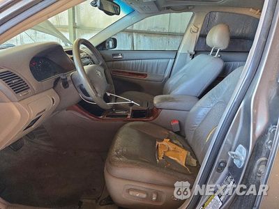 Zdjęcie 7 z 12 samochodu: 2004 TOYOTA CAMRY XLE VIN:4T1BE30K94U938599 - miniatura