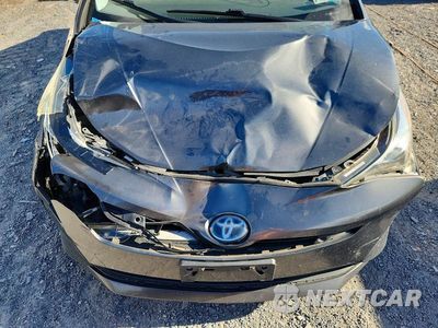 Zdjęcie 12 z 13 samochodu: 2017 TOYOTA PRIUS TWO VIN:JTDKBRFU4H3041727 - miniatura
