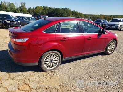 Trzecie zdjęcie samochodu z tyłu: 2014 FORD FOCUS TITANIUM VIN:1FADP3J29EL234289 - miniatura