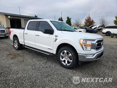 Czwarte zdjęcie samochodu z boku: 2022 FORD F150 SUPERCREW VIN:1FTFW1ED6NFB23753 - miniatura
