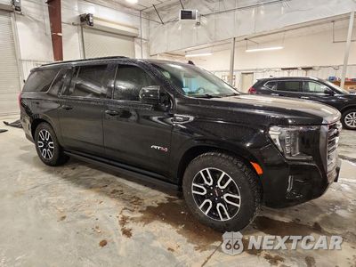 Czwarte zdjęcie samochodu z boku: 2021 GMC YUKON XL K1500 AT4 VIN:1GKS2HKD4MR261042 - miniatura