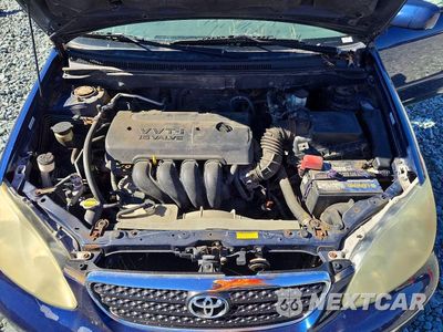 Zdjęcie 11 z 12 samochodu: 2005 TOYOTA COROLLA LE VIN:1NXBR32E75Z564801 - miniatura