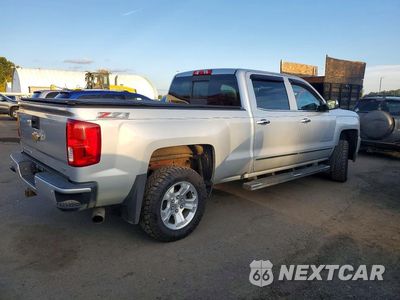 Trzecie zdjęcie samochodu z tyłu: 2017 CHEVROLET SILVERADO K1500 LTZ VIN:3GCUKSEJ3HG410579 - miniatura