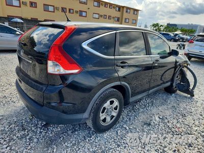 Trzecie zdjęcie samochodu z tyłu: 2013 HONDA CR-V LX VIN:3CZRM3H31DG701119 - miniatura