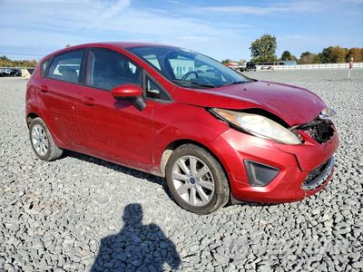 Czwarte zdjęcie samochodu z boku: 2012 FORD FIESTA SE VIN:3FADP4EJ3CM186257 - miniatura