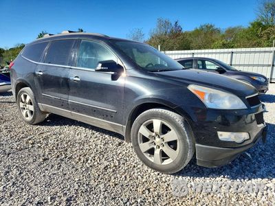Czwarte zdjęcie samochodu z boku: 2012 CHEVROLET TRAVERSE LTZ VIN:1GNKRLED6CJ114411 - miniatura