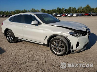 Czwarte zdjęcie samochodu z boku: 2024 BMW X4 XDRIVE30I VIN:5UX33DT04R9V19471 - miniatura