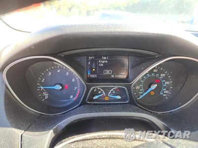 Zdjęcie 9 z 12 samochodu: 2014 FORD FOCUS TITANIUM VIN:1FADP3N22EL338603 - miniatura
