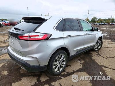 Trzecie zdjęcie samochodu z tyłu: 2019 FORD EDGE TITANIUM VIN:2FMPK3K90KBC46677 - miniatura