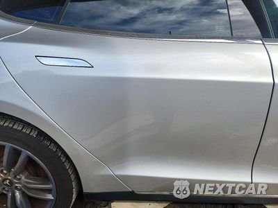 Zdjęcie 10 z 12 samochodu: 2014 TESLA MODEL S VIN:5YJSA1H1XEFP28586 - miniatura