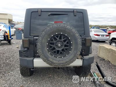 Zdjęcie 6 z 12 samochodu: 2012 JEEP WRANGLER UNLIMITED SAHARA VIN:1C4BJWEG1CL277953 - miniatura