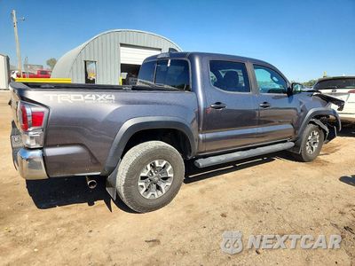 Trzecie zdjęcie samochodu z tyłu: 2020 TOYOTA TACOMA TRD OFF-ROAD VIN:5TFCZ5AN3LX216415 - miniatura