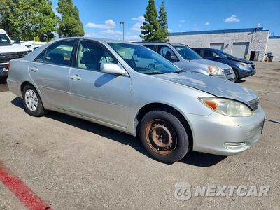 Czwarte zdjęcie samochodu z boku: 2003 TOYOTA CAMRY LE VIN:JTDBE32K430153690 - miniatura