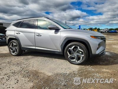 Czwarte zdjęcie samochodu z boku: 2022 HYUNDAI TUCSON LIMITED VIN:KM8JECA10NU040587 - miniatura