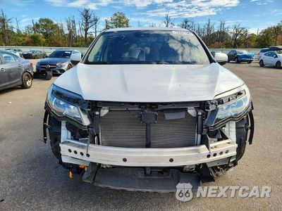 Piąte zdjęcie samochodu w środku: 2021 HONDA PILOT EXL VIN:5FNYF6H59MB037950 - miniatura