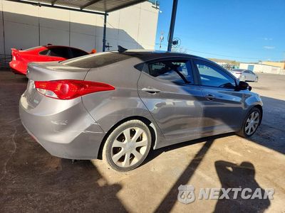 Trzecie zdjęcie samochodu z tyłu: 2012 HYUNDAI ELANTRA LIMITED VIN:5NPDH4AE0CH090124 - miniatura