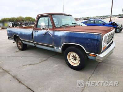 Czwarte zdjęcie samochodu z boku: 1984 DODGE D-SERIES D200 VIN:1B7JD24W7ES337599 - miniatura