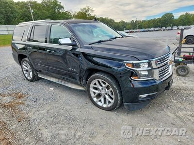 Czwarte zdjęcie samochodu z boku: 2015 CHEVROLET TAHOE C1500 LTZ VIN:1GNSCCKC2FR510421 - miniatura