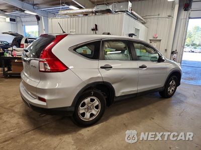 Trzecie zdjęcie samochodu z tyłu: 2016 HONDA CR-V LX VIN:5J6RM4H38GL114008 - miniatura