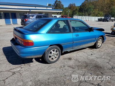 Trzecie zdjęcie samochodu z tyłu: 1994 FORD ESCORT LX VIN:1FARP11J6RW223496 - miniatura