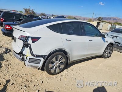 Trzecie zdjęcie samochodu z tyłu: 2021 TESLA MODEL Y VIN:5YJYGDEE8MF232010 - miniatura