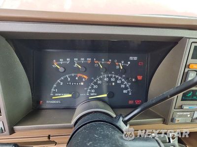 Zdjęcie 9 z 12 samochodu: 1994 GMC SUBURBAN K1500 VIN:1GKFK16K4RJ767882 - miniatura