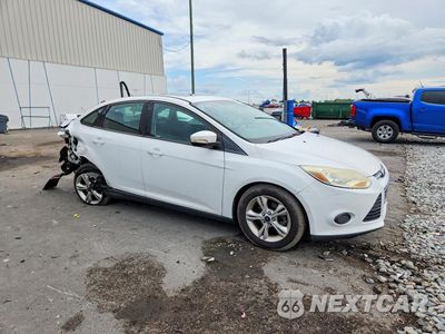 Czwarte zdjęcie samochodu z boku: 2013 FORD FOCUS SE VIN:1FADP3F20DL157092 - miniatura