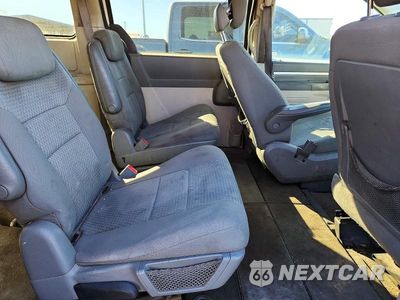 Zdjęcie 11 z 13 samochodu: 2010 DODGE GRAND CARAVAN SE VIN:2D4RN4DE1AR335395 - miniatura