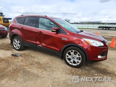 Czwarte zdjęcie samochodu z boku: 2016 FORD ESCAPE TITANIUM VIN:1FMCU9JX2GUA11257 - miniatura