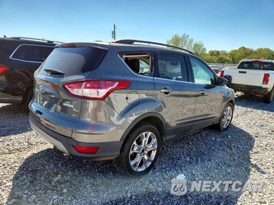 Trzecie zdjęcie samochodu z tyłu: 2014 FORD ESCAPE SE VIN:1FMCU0GX9EUA12244 - miniatura