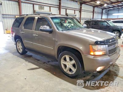 Czwarte zdjęcie samochodu z boku: 2011 CHEVROLET TAHOE C1500 LTZ VIN:1GNSCCE07BR384343 - miniatura