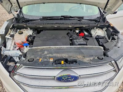 Zdjęcie 12 z 14 samochodu: 2018 FORD EDGE SEL VIN:2FMPK4J89JBB71734 - miniatura