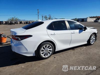 Trzecie zdjęcie samochodu z tyłu: 2023 TOYOTA CAMRY LE VIN:4T1C11AK7PU136382 - miniatura