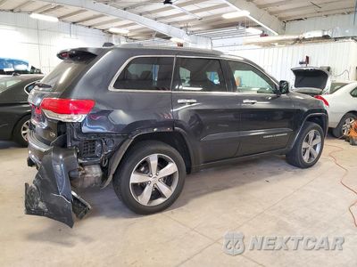 Trzecie zdjęcie samochodu z tyłu: 2014 JEEP GRAND CHEROKEE OVERLAND VIN:1C4RJFCG5EC219140 - miniatura