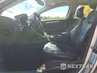 Zdjęcie 7 z 13 samochodu: 2014 FORD FUSION TITANIUM VIN:3FA6P0K9XER320344 - miniatura