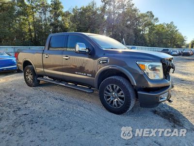 Czwarte zdjęcie samochodu z boku: 2016 NISSAN TITAN XD PLATINUM RESERVE VIN:1N6BA1F29GN502276 - miniatura