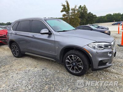 Czwarte zdjęcie samochodu z boku: 2018 BMW X5 XDR40E VIN:5UXKT0C51J0W02770 - miniatura