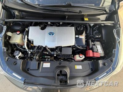 Zdjęcie 7 z 14 samochodu: 2016 TOYOTA PRIUS TWO VIN:JTDKBRFU7G3512641 - miniatura