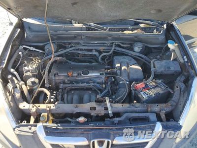 Zdjęcie 12 z 13 samochodu: 2004 HONDA CR-V EX VIN:JHLRD78844C057677 - miniatura