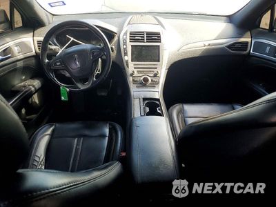 Zdjęcie 8 z 12 samochodu: 2017 LINCOLN MKZ PREMIERE VIN:3LN6L5A9XHR651090 - miniatura
