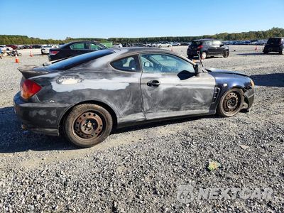 Trzecie zdjęcie samochodu z tyłu: 2004 HYUNDAI TIBURON GT VIN:KMHHN65FX4U118474 - miniatura