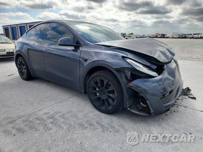 Czwarte zdjęcie samochodu z boku: 2022 TESLA MODEL Y VIN:7SAYGDEE2NA006045 - miniatura