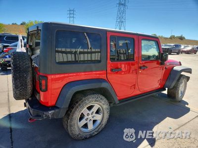 Trzecie zdjęcie samochodu z tyłu: 2015 JEEP WRANGLER UNLIMITED RUBICON VIN:1C4BJWFG7FL591044 - miniatura